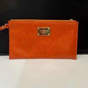 Michael Kors Orange MK Logo Fulton Wristlet Clutch with Gold Plaque